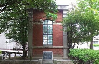 Foundation monument (side wall of the old boiler room that escaped the air raid)